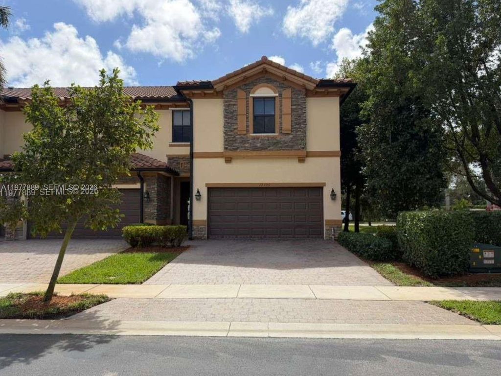 Photo of 12350 S Village Cir, Davie, FL 33325 (MLS # A11977889)