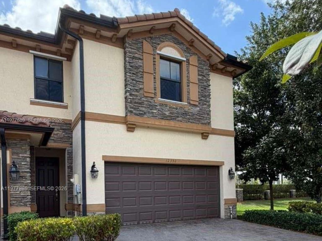 Photo of 12350 S Village Cir, Davie, FL 33325 (MLS # A11977889)