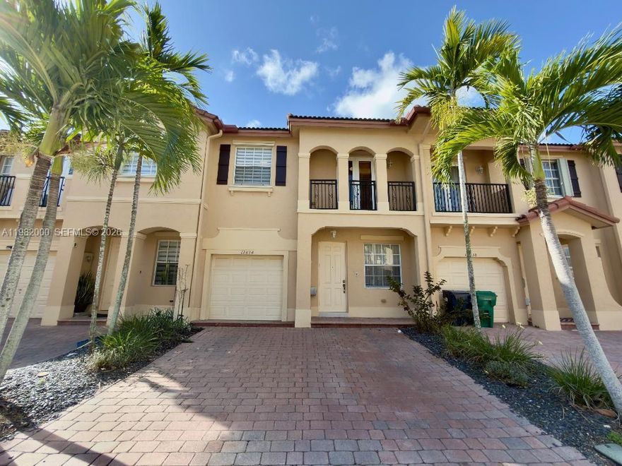 Beautiful 3BR/2.5BA townhome in Tuscany. its been remodeled unit 24 x 48 tile floors remodeled kitchen and baths , quartz countertops, stainless steel appliances, newer laminated floors upstairs waterproof, master bedroom has dual sinks with huge walk in closet, fenced in patio with no neighbors in the back, perfect for entertaining 1 car garage and 2 spots in the front, Home has a den that can be converted to 4th bedroom upstairs.  Community has two pools, a clubhouse, gym, 24/7 security. The HOA covers common areas and basic cable.