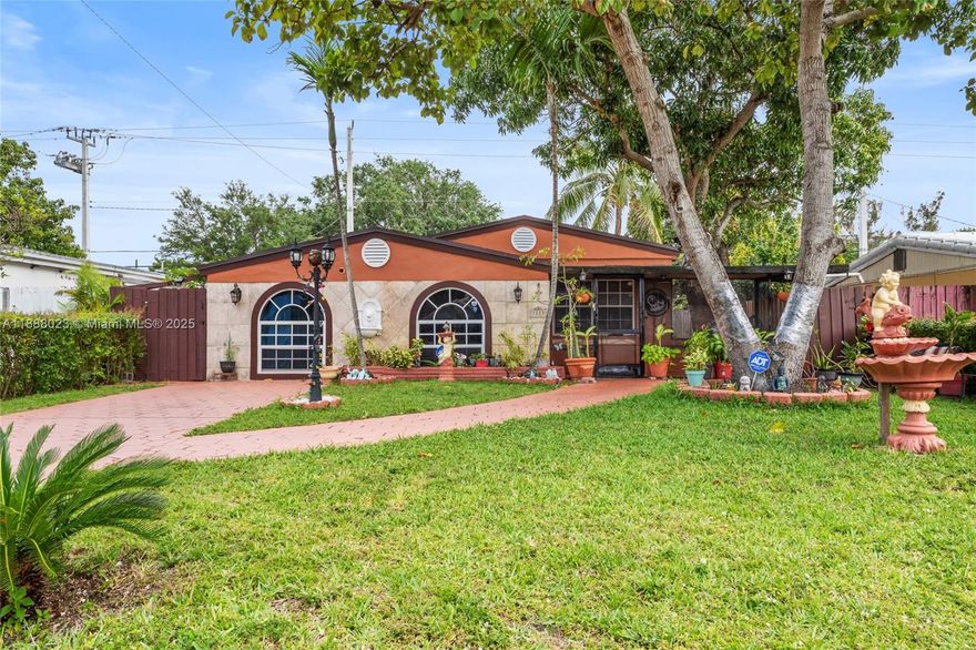 Beautiful, well-maintained 3-bedroom, 2-bath home with a converted fourth bedroom that includes its own private entry, perfect for guests, a home office, or as efficiency for added income. Features a brand new roof and a bright, open layout. Conveniently located just a short drive to the beach, shopping, and major highways. Move-in ready and full of potential!