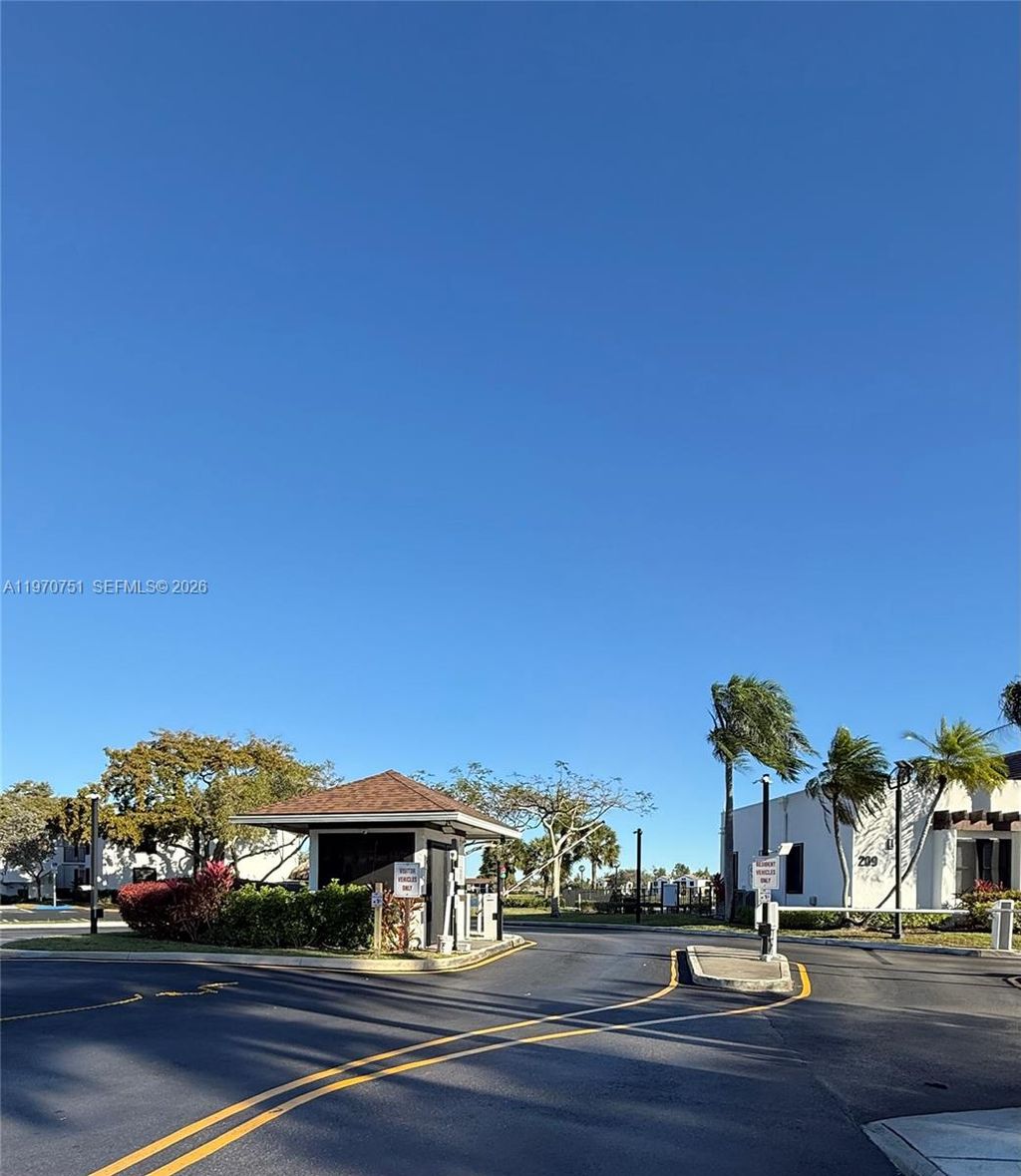 Photo of 201 Lake Pointe Dr #202, Oakland Park, FL 33309 (MLS # A11970751)