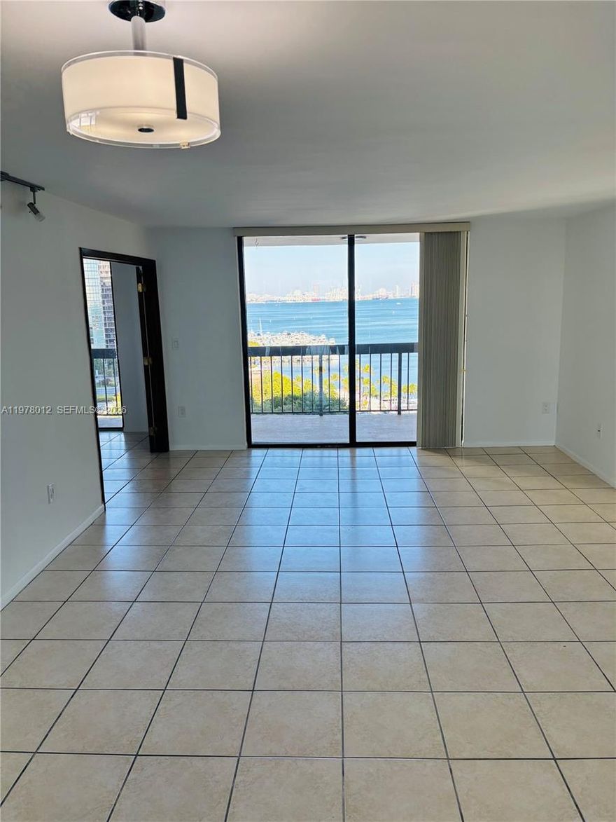 SPECTACULAR VIEW TO THE BAY, NATURAL LIGHT, MORNING SUN, 2 BEDROOM & 2 BATHS, TILE FLOORS THROUGHOUT UNIT, WASHER & DRYER INSIDE, 5 TENNIS COURTS WITH LIGHTS, HEATED LAP POOL,, STATE OF THE ART GYM, BEAUTY SALON, CONVENIENT STORE, 24/7 SECURITY IN LOBBY & GATE, AND OTHER AMENITIES.