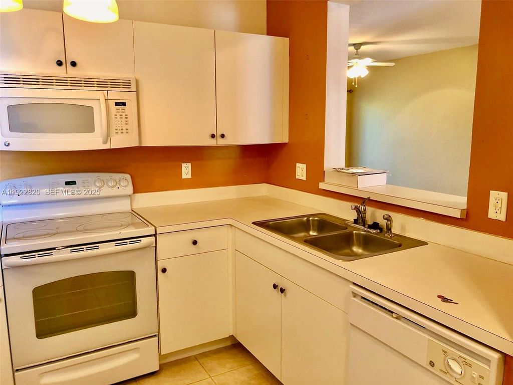 Photo of 1165 Golden Lakes Blvd #1226, West Palm Beach, FL 33411 (MLS # A11922820)