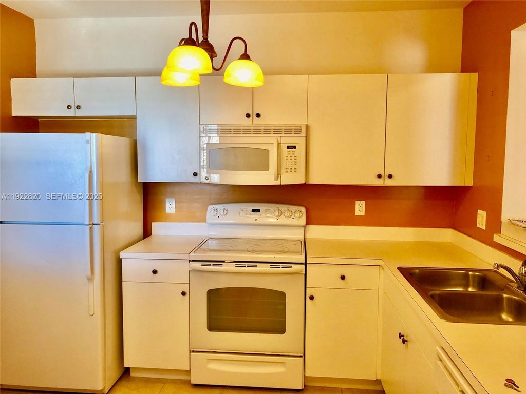 Photo of 1165 Golden Lakes Blvd #1226, West Palm Beach, FL 33411 (MLS # A11922820)