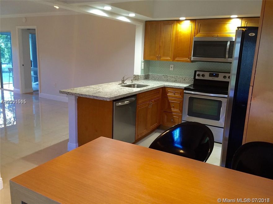 Stunning 2 bed 2 bath located in gated community Monterey Village. Featuring washer and dryer unit, porch, open kitchen with stainless steel appliances and breakfast area. Community has swimming pool, jacuzzi, and parking space. Very well maintained community. Pets welcome