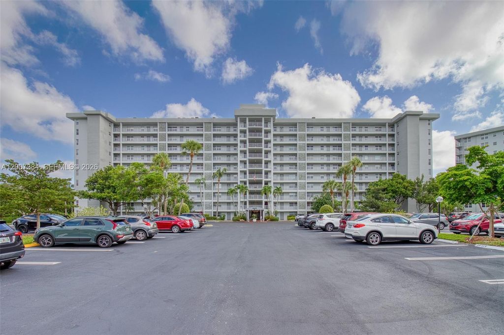 Photo of 4015 W Palm Aire Dr #506, Pompano Beach, FL 33069 (MLS # A12007384)