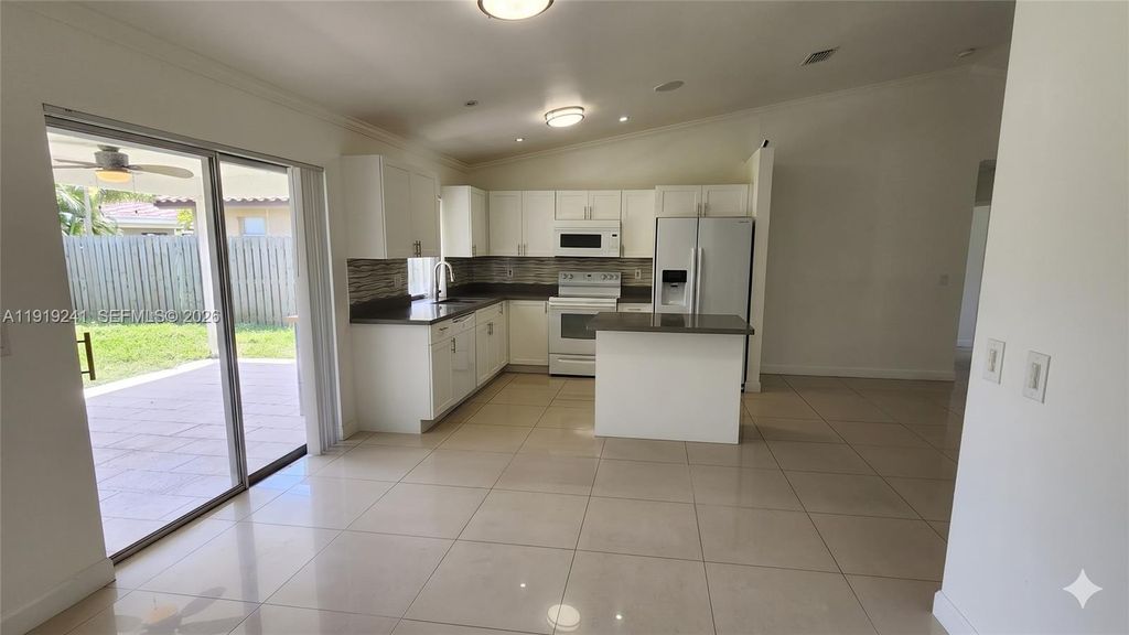 Photo of 2713 NW 123rd Ave, Coral Springs, FL 33065 (MLS # A11919241)