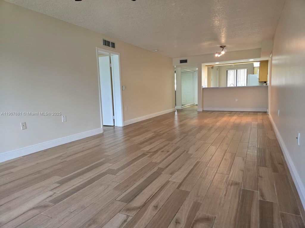 Photo of 2701 N Village Blvd #102, West Palm Beach, FL 33409 (MLS # A11907681)