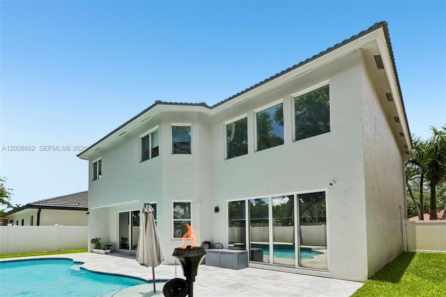Welcome to this beautifully maintained, move-in ready home located in a wonderful family-friendly community! From the moment you arrive, you'll appreciate the pride of ownership and thoughtful upgrades throughout. The spacious, open-concept floor plan offers plenty of room for everyday living and entertaining, while all bedrooms are generously sized, providing comfort and flexibility for the entire family.

Enjoy a long list of recent improvements, including fully updated bathrooms, granite countertops, new Samsung appliances, a whole-home tankless water heater, and zebra blinds throughout. The home is equipped with smart home technology featuring over 6 security cameras, an FPL Unlimited EV charger, and a new FPL-approved sub-panel extension.

Step outside to your private backyard oasis featuring a newly remodeled marble pool deck, new privacy fence, fresh exterior paint, and custom exterior lighting that enhances the home's curb appeal day and night. Additional upgrades include a new HVAC system and a garage with a durable epoxy-coated floor.

This is a home that has been exceptionally cared for and thoughtfully upgraded, offering the perfect combination of style, comfort, functionality, and modern convenience. Don't miss the opportunity to make this beautiful property your next home!