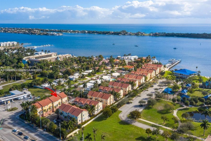 RARE Fully Furnished, Move-In Ready! This 3-story townhouse is located in a private community on the Intracoastal Waterway. Featuring 3 bedrooms plus a den on the first floor, 2.5 bathrooms, and a 2-car garage, this home was built in 2004 with impact windows. 2023 AC unit, 2022 kitchen appliances, a 2017 washer/dryer, and a 2017 water heater. Gorgeous and quiet waterfront community. Also available for rent at $4500/ mo (6 mo minimum)