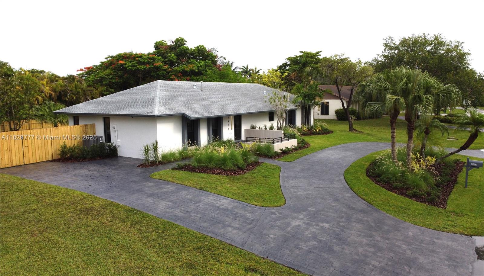 Welcome to this beautifully designed 4BD/2BA + flex room pool home in the heart of Palmetto Bay. Sitting on a 15,000 sq.ft. lot, this fully renovated residence blends modern design with everyday comfort. Inside, enjoy a sleek European-style kitchen with a 10-ft island, high-end fixtures, premium appliances, and custom cabinetry—perfect for gathering. The open floor plan features tons of natural light, custom closets and interior doors, and two stylishly updated bathrooms. A versatile flex room offers space for a home office, playroom, or den. Step outside to a newly refinished pool and marble patio—ideal for entertaining or relaxing. With impact windows, new roof (2019), new A/C (2025), new fence (2025) and great schools nearby, this home is turnkey, timeless, and truly family-ready.