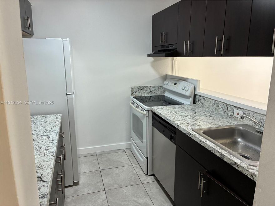 2/1.5 just crossing street to the Miami-Dade College MDC. Owner occupant Buyers and investors gem freshly painted. Enjoy a bright living area that flows into the dining space and a kitchen, the spacious bedrooms include a primary with a private half bath and a stylish full bathroom. one assigned parking and plenty guest and street parking.
Relax on your private balcony and take advantage of community amenities like a pool, tennis court, play ground, laundry room on each floors and an elevator. Parking is easy with an assigned garage spot and guest parking, plus on-site laundry facilities for added convenience.