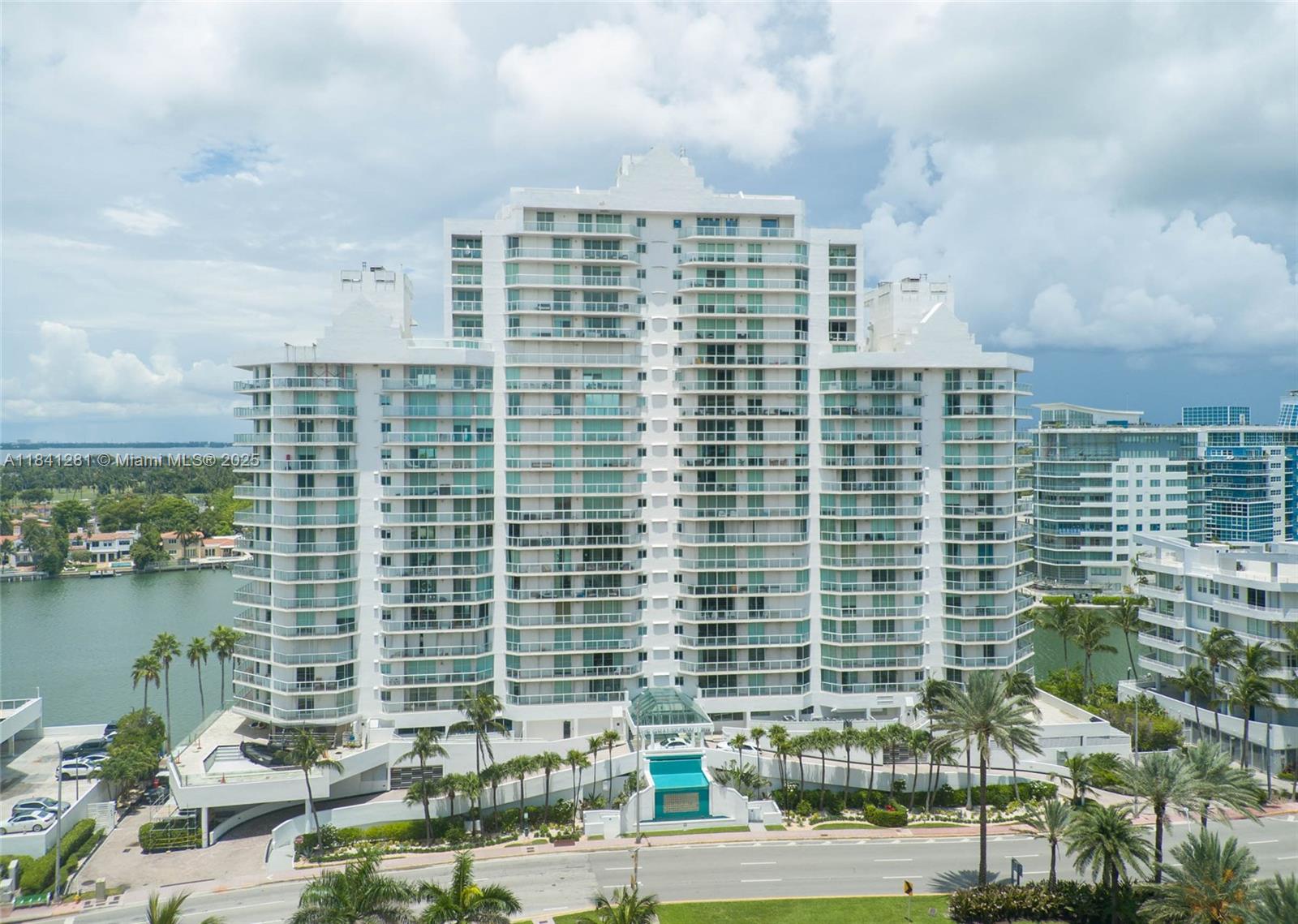 This Millionaires' Row home is all about the ocean, bay and city's magnificent unobstructed views! This fabulous One-of-a-Kind 3 Bedrooms and 2 Bath apartment has three large wraparound balconies. This residence has been totally updated with the highest quality and special attention to details. Some built in furniture (desk, book shells,entertainment) stay in the unit as well as the wine cooler. Baths completely updated with modern cabinetry and top of the line appliances. Custom made closets in all three bedrooms. Private elevator and foyer entrance. Building Amenities: Heated pool, Jacuzzi, bike storage room, paddle board storage, direct access to the intracoastal and conveniently located across the street from the beach public access. Lobby attendance and 2 valet parking spot included.
