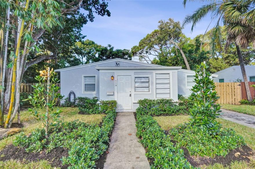 Welcome to this charming 3-bedroom, 2-bathroom single-family home offering 1,065 sq ft of comfortable living space. Featuring updated bathrooms, tile flooring throughout, and a modern kitchen with stainless steel appliances, this home is move-in ready. Enjoy the convenience of an in-home washer and dryer, and relax in the lush tropical landscaping that surrounds the property. The fully fenced backyard provides a private outdoor space perfect for pets to play or for weekend gatherings. Located just minutes from major highways and close to downtown Fort Lauderdale, this residence combines tranquility with accessibility. A perfect blend of style and location!