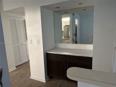 Photo of 7735 NW 79th Ave #214, Tamarac, FL 33321 (MLS # A11871765)