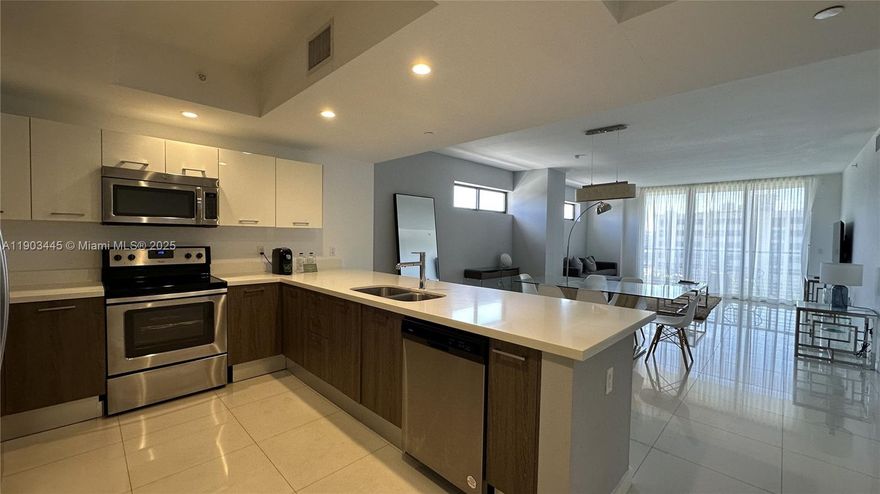 Discover this stunning fully furnished 2-bedroom, 2-bath apartment at Bay Breeze Residences—perfect for investors, new buyers, or families seeking a stylish, turnkey property! Certified as a short-term rental, it offers lucrative income potential right away. The apartment features a fully equipped kitchen with premium granite countertops, and curtains and blackouts installed throughout the entire unit. The building boasts a rooftop pool and provides 2 parking spaces per unit.  Don’t miss out on this incredible opportunity!