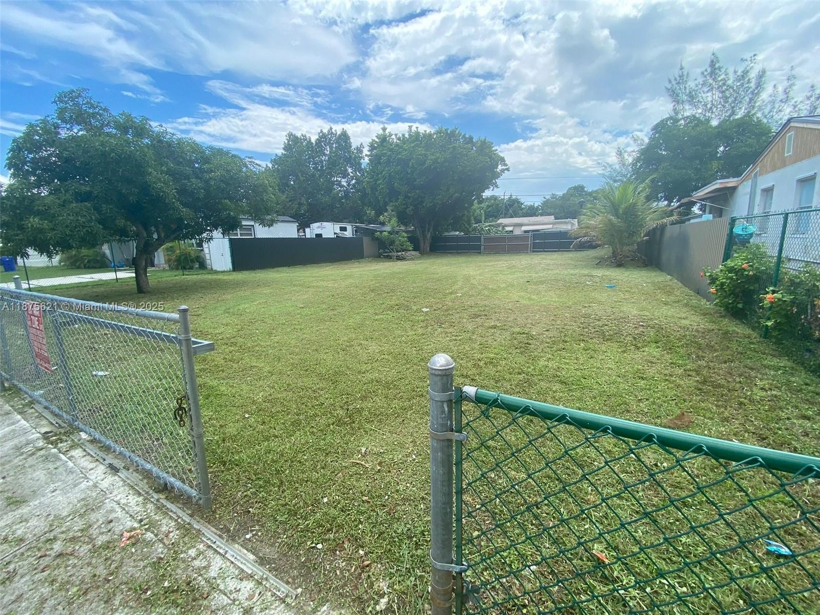 Prime opportunity for developers and investors! This vacant land at 1350 NW 51 Terrace comes with APPROVED PLANS, IMPACT FEES PAID, and is FULLY READY TO BUILD. Whether you are looking to construct your dream home, develop for resale, or expand your investment portfolio, this property offers a head start with all the groundwork done. Located just minutes from Wynwood and the Miami Design District, this shovel-ready lot sits in a growing neighborhood with excellent potential. Don’t miss the chance to secure this unique opportunity!
