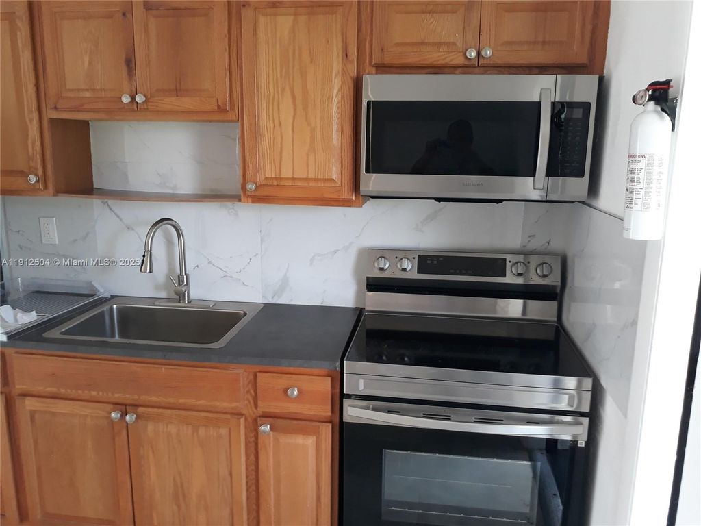 Photo of 601 NW 4th Ct #2, Hallandale Beach, FL 33009 (MLS # A11912504)