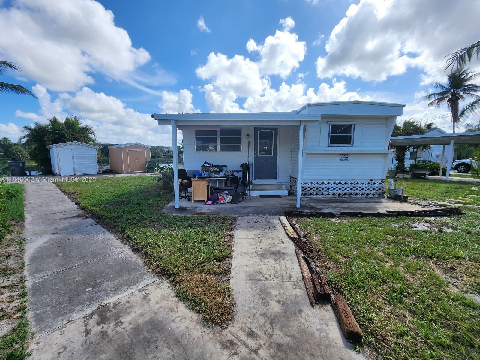 Enjoy a stunning lake view from the backyard in this bright and airy 2-bedroom, 1.5-bath mobile home featuring central air conditioning, a patio, a storage shed, an open backyard, and covered parking.
Conveniently located near downtown West Palm Beach, Brightline, restaurants, nightlife, and beaches.
Move-In Requirements:
?? Total move-in cost equals 3x the monthly rent
?? It may consist of: first month + last month + security deposit OR first month + 2 security deposits, depending on application
?? Proof of income required
?? No prior evictions
?? Rapid approval!
Don’t miss the chance to make this lovely home yours!