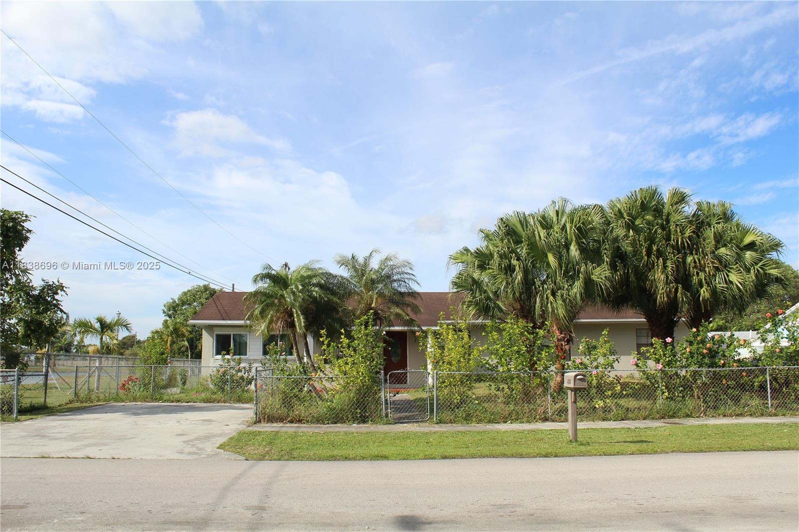 Great investment property! It needs some TLC! 4 Bedroom 2 Bathroom Single Family Home with no HOA!! Extra room could potential be a 5th bedroom or a office/playroom. Home features tile through out, granite counter top with wood cabinets. Stainless steel appliances. Full impact windows & doors. Property is fully fenced with room for boat and rv! Fruit trees. Corner Lot right next to William J minutes Park. Beautiful views of the lake right from your home. Close to shopping centers and only 30 minutes away from the Florida Keys & 18 minutes from Flamingo National park!