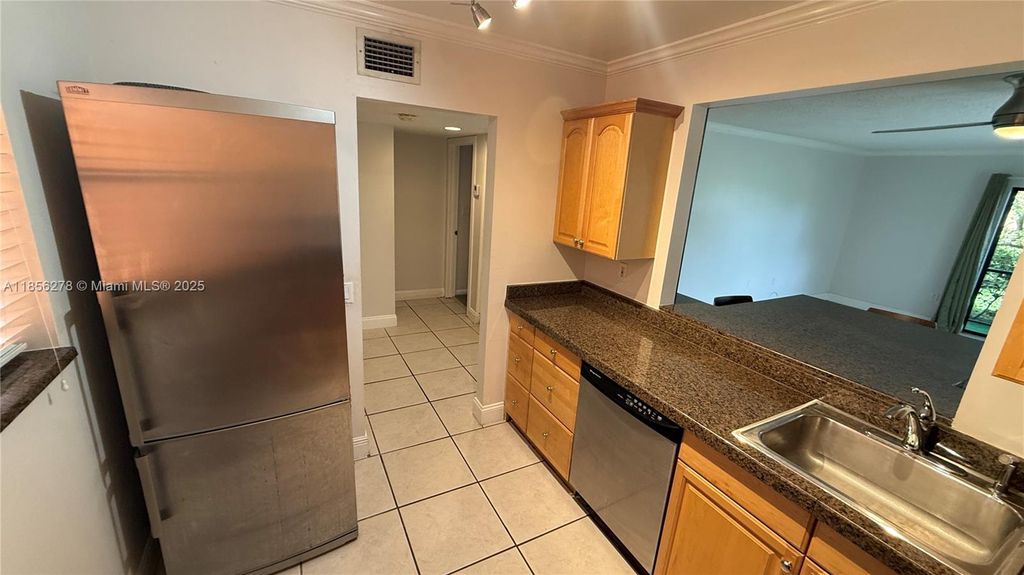 Photo of 8851 N New River Canal Rd #11E, Plantation, FL 33324 (MLS # A11856278)