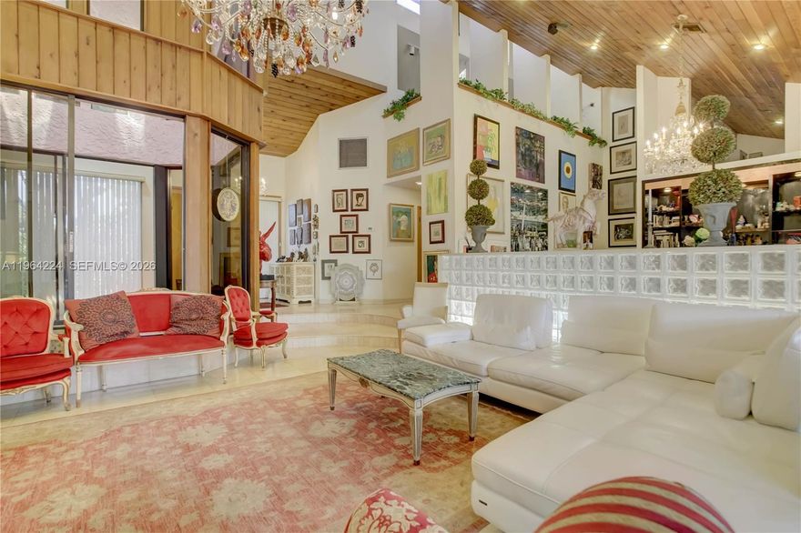 TRANSFORM THIS 22’ CEILINGS 5000 SF/AC+/- 5BD/4BA+DEN+2ND STORY LOFT, OPEN FLOOR PLAN BACKING ONTO EXCLUSIVE AUBERGE RESORT SHELL BAY GOLF & COUNTRY CLUB. OVERSIZED 1200 SF PRIMARY SUITE W/16’ CEILINGS. EXPANSIVE PRIMARY BATH SF. SOARING GLASS THROUGHOUT + 5 SKYLIGHTS GIVE AMPLE NATURAL LIGHT. TRAVERTINE THROUGHOUT. ATRIUM IN ENTRY FOYER OPEN TO THE SKY. SURROUND SOUND IN & OUT. ZEBRANO WOOD KITCHEN W/MIELE APPLIANCES. WHOLE HOUSE GENERATOR. COVERED OUTDOOR ENTERTAINING W/ LARGE 24’X32’ MOSAIC TILED HEATED SALTWATER POOL. OUTDOOR BBQ COOKING AREA. 9 FT ELEVATION. FRONT ENTRY ACTIVE KOI FISH POND. 10 YEAR OLD ROOF & MAJORITY IMPACT GLASS. TWO CAR GARAGE W/WORK AREA.