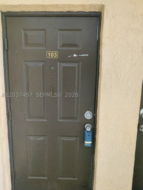 Photo of 17415 NW 75th Pl #103, Hialeah, FL 33015 (MLS # A12037457)