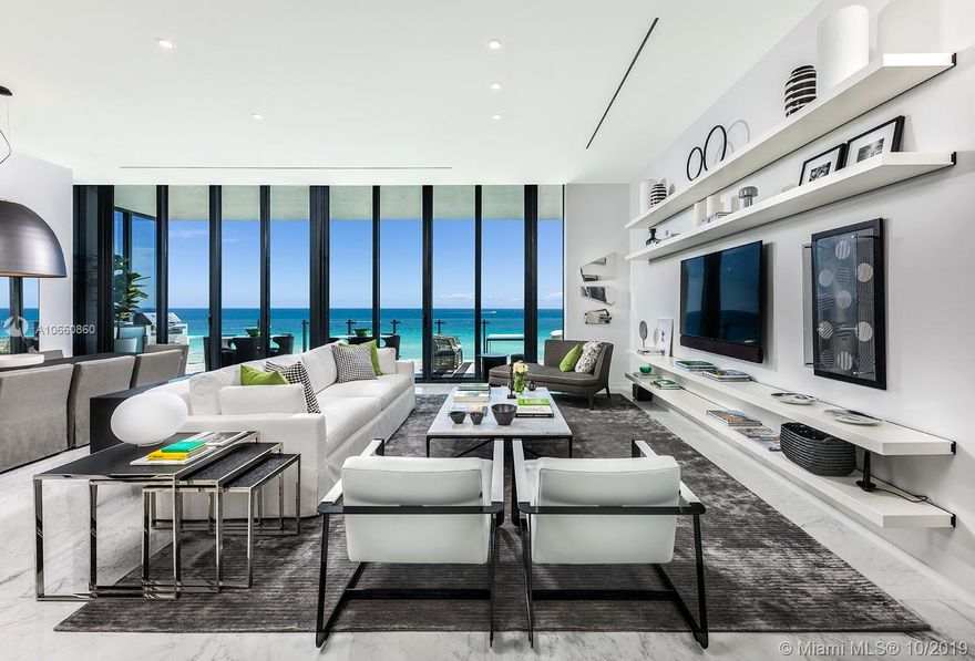 ONLY IN PERSON YOU CAN REALLY APPRECIATE THIS MAGNIFICENT TURNKEY OCEAN FRONT, 4 BEDS, 3 1/2 BATHS PROFESSIONALLY DECORATED AND NO EXPENSES SPARED. THIS IS PERFECT FOR A FAMILY OR  IF YOU LIKE TO ENTERTAIN. THE TERRACE, WITH SUMMER KITCHEN &  ASTONISHING 720 SQ.FT IS THE CONTINUATION OF THE LIVING, DINING & MASTER BEDROOM AREAS. THE INTERIOR WAS DESIGNED BY A WELL KNOWN BRAZILIAN TEAM & THIS HOME FEATURES LUXURY FINISHES SUCH AS MARBLE & WOOD FLOORS, ITALIAN FURNITURE, WALK IN CLOSETS IN EVERY ROOM, SMART HOME & MUCH MORE. THIS CONDO HAS BEEN UPDATED LIKE NO OTHER. KITCHEN CONTAINS 2 SUBZERO REFRIGERATORS, 2 SUBZERO FREEZERS, 2 DISHWASHERS, 2 OVENS, 2 WARMERS, MICROWAVE & PLENTY OF CABINETRY & CATERING AREA. YOU MUST SEE THIS UNIT. SPECIAL AREA FOR PLAY ROOM OR OFFICE. EASY TO SHOW, CALL.