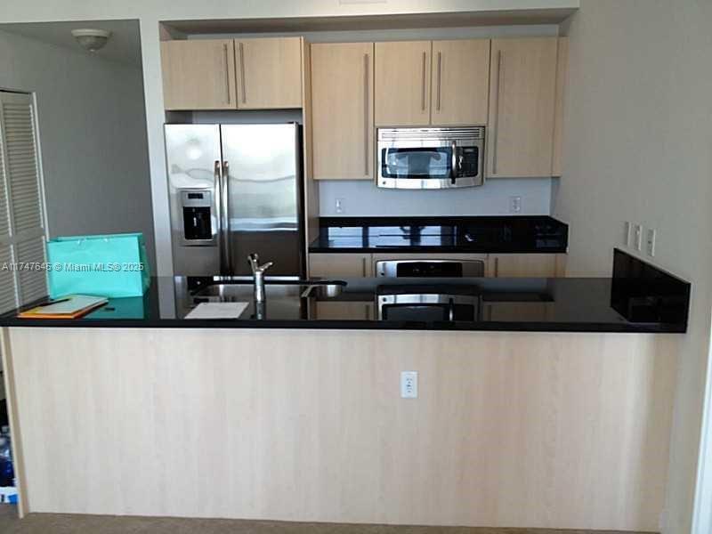 THE AXIS ON BRICKELL COND - Residential Lease