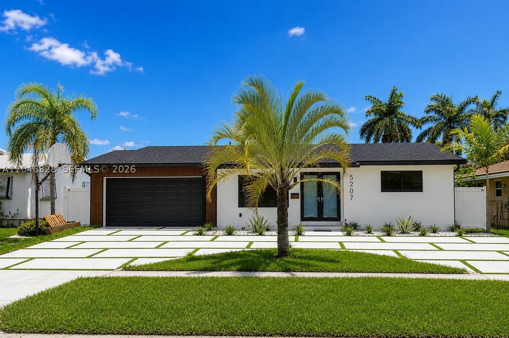Photo of 5207 Roosevelt St, Hollywood, FL 33021 (MLS # A12046328)