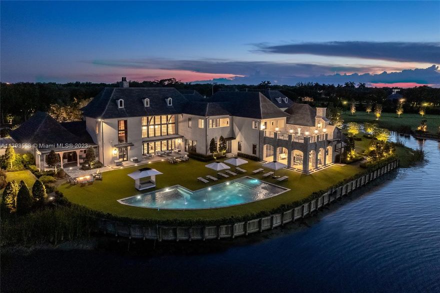This amazing 2-story French Country style mansion in Southwest Ranches is truly like no other in all South Florida. The fully gated resort-style 7BR/8+2BA residence offers 6.43 acres of elegant, manicured grounds & a large private lake. No expense has been spared using only the finest materials & attention to every design detail. Featuring a state-of-the-art movie theater, soaring 30FT+ceilings, expansive living, dining, family entertaining areas, 2 offices & a sumptuous principal suite with a custom 2-story closet & spa inspired bathroom. The outdoor areas of the home were designed to entertain w/infinity pool, covered lounge area, summer kitchen w/bar, & more. Adjacent to the home is another 2-story French Country style mansion also available & can be purchased together at $47M.