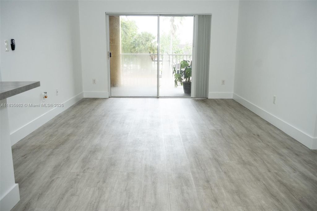 Photo of 2600 S University Dr #311, Davie, FL 33328 (MLS # A11835862)