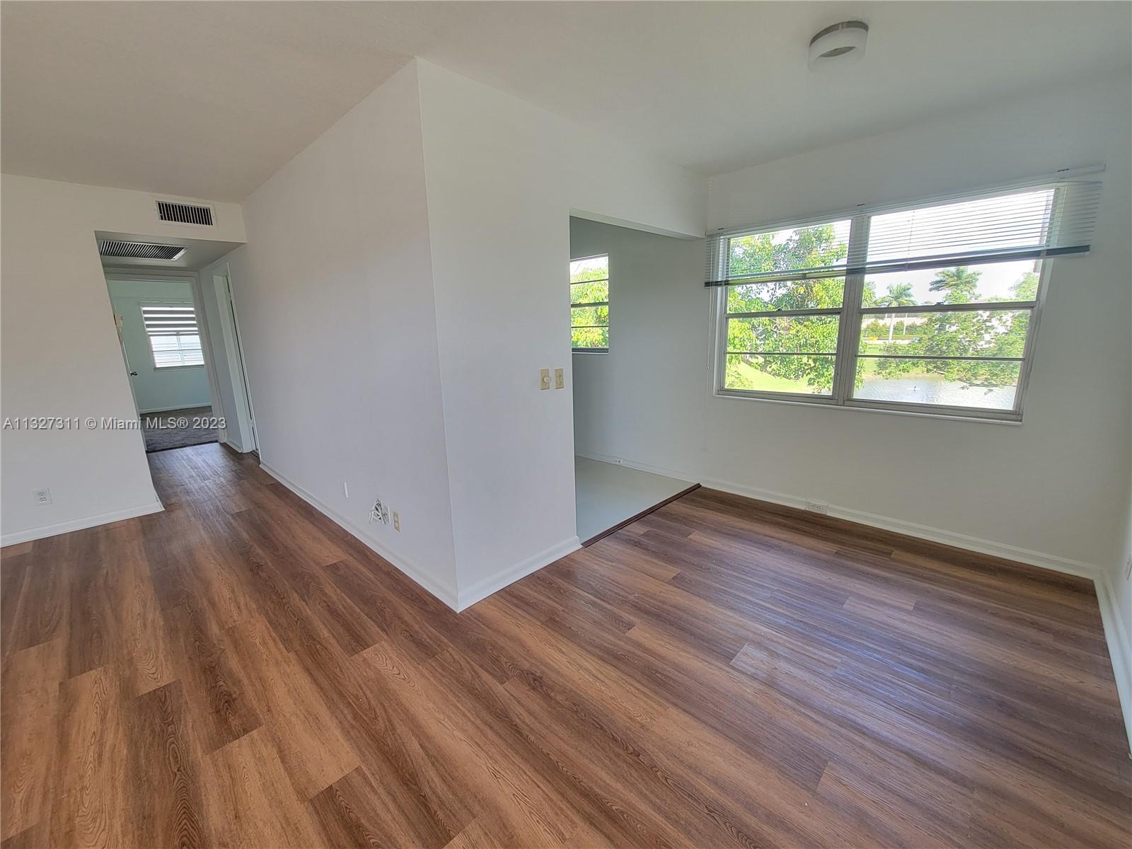 Renovated, corner unit, with garden and lake view available for annual rent. 10 minutes from the ocean by car. New master bathroom, new appliances, new tile floor in bathroom and kitchen, new wood flooring, lots of closets, peaceful and relaxing view from the screened balcony. There are elevator and a laundry room on each floor, Basic cable, water and internet are included. In Century Village you will have a resort style experience where you can enjoy the 125,000 sq foot Clubhouse with new fitness center, multiple swimming pools, tennis courts, pickleball courts, amazing live shows, ping pong, billiard rooms movie theater , workout classes, bingo, card rooms and transportation, free shuttle bus. Secured and gated community. Condo approval is required, 1 person must be 55+, no pets.