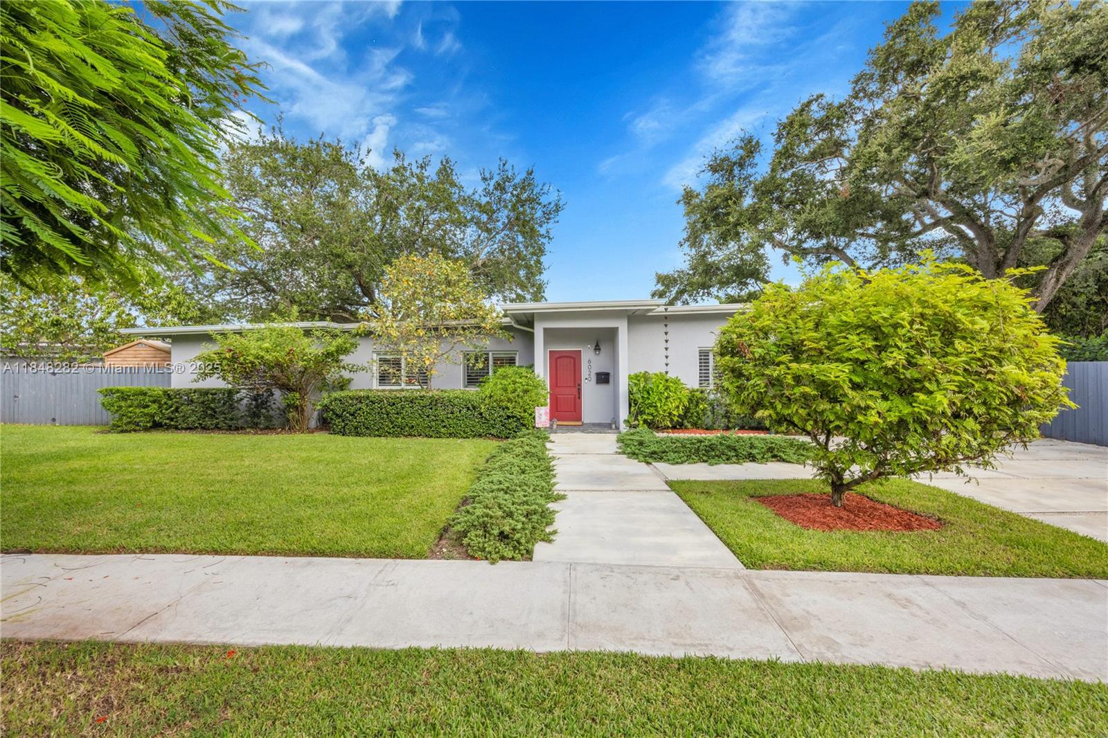 Wow! Stunning renovation w/premium updates! Relax in your saltwater pool (2020), then retreat indoors to a gorgeous renovation. Lovely finishes: dark wood floors, marble, granite, blue quartz, custom built-ins and lovely lighting throughout.The primary suite features dramatic high ceilings and a spa-like bath w/glass shower, double vanity & illuminated mirror. Split floor plan includes spacious laundry room, Impact windows and doors, instant hot water heater, plantation shutters and newer AC 2023. The yard and outside amenities were completed in 2020: new roof, gutters, septic system, driveway, pergola, front yard sprinklers and EV charging station. Underground electrical service. Native landscaping attracts colorful song birds birds year-round. Mature fruit trees. Living area is 1676 SF.