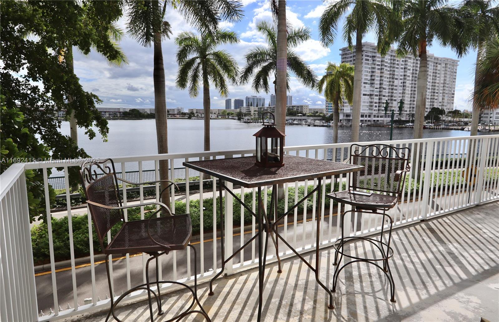 CORNER (2) BEDROOM, (2) BATHS CONDOMINIUM WITH 1,693 SQ. FT. IN AVENTURA, FLORIDA, BOASTS BREATHTAKING WATER VIEWS. LARGE EAT-IN KITCHEN! THIS CONDO OFFERS PRIVACY AND SPACE, PERFECT FOR RESIDENTS SEEKING TRANQUILITY AND LUXURY. ENJOY THE SERENE AMBIANCE OF THE BEAUTIFUL WATERVIEWS OF THE LAKE COUPLED WITH THE CONVENIENCE OF AVENTURA'S VIBRANT LIFESTYLE & PLENTY OF AMENITIES. TENNIS COURTS, TWO (2) POOLS, PUTTING GREEN, MODERN GYM, BASKETBALL COURT, BICYCLE STORAGE. 24-HOUR SECURITY. STEPS TO HOUSE OF WORSHIP & SHOPPING. CLOSE TO BEACHES, AVENTURA MALL, BAL HARBOUR SHOPS, FIU, TWO (2) AIRPORTS, I-95, HARD ROCK STADIUM & HOTEL, GULFSTREAM VILLAGE, BRIGHTLINE STATION, WYNWOOD, EDGEWATER, BRICKELL & FINE RESTAURANTS. COURTESY BUS SERVICE! 24-HR SECURITY GUARD GATE & SECURITY IN THE LOBBY!
