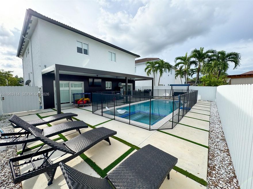 Lovely fully renovated 3 bedrooms and 2 ½ bathrooms home. Large white 48” x 24” porcelain tile, impact windows, all bathrooms are renovated, luxury kitchen with wood cabinets, COMPAC quartz countertops and premium appliances, recessed LED light throughout entire home, family room with plenty of natural light and pool view, terrace, concrete backyard, heated swimming pool with smart pool lighting and smart equipment, security cameras, new fence, 2-car garage. NO HOA, very good location close to shopping malls and highways.