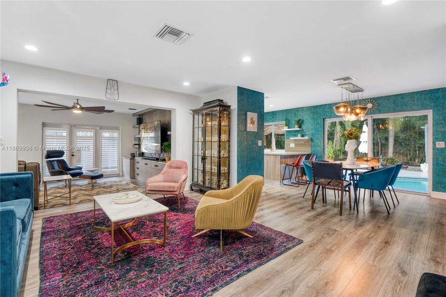 Stunning Mid Century Modern home in Imperial Point that has been remodeled and decorated inside and out. The outdoor kitchen, bar and pool with lounging and eating areas create a personal paradise. Large open interior with an open kitchen, dining area, living room and large TV room. This bright sunny home brings the outside in. Primary bedroom with ensuite bath has access to the pool. Third bedroom can also be a perfect home office. Completely fenced in and private with a tropical garden. You can walk to cafes and restaurants and a short drive to the beach or take your bicycle. You can also purchase fully furnished if looking for a second home or vacation rental.