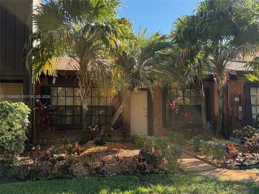 Exceptionally maintained 2 bedroom, 2 bath villa with a spacious loft and striking vaulted wood-beam ceilings that add warmth and architectural charm.  The open concept living area features tile flooring and abundant natural light.  An upgraded kitchen showcases rich wood cabinetry, stainless steel appliances and a custom vent hood.  Tile flooring throughout enhances durability and easy maintenance.  Both bathrooms are meticulously updated.  Enjoy seamless indoor outdoor living with a screened back patio, providing a private sanctuary for morning coffee or evening entertaining.  A unique and well designed home offering comfort, character and style!