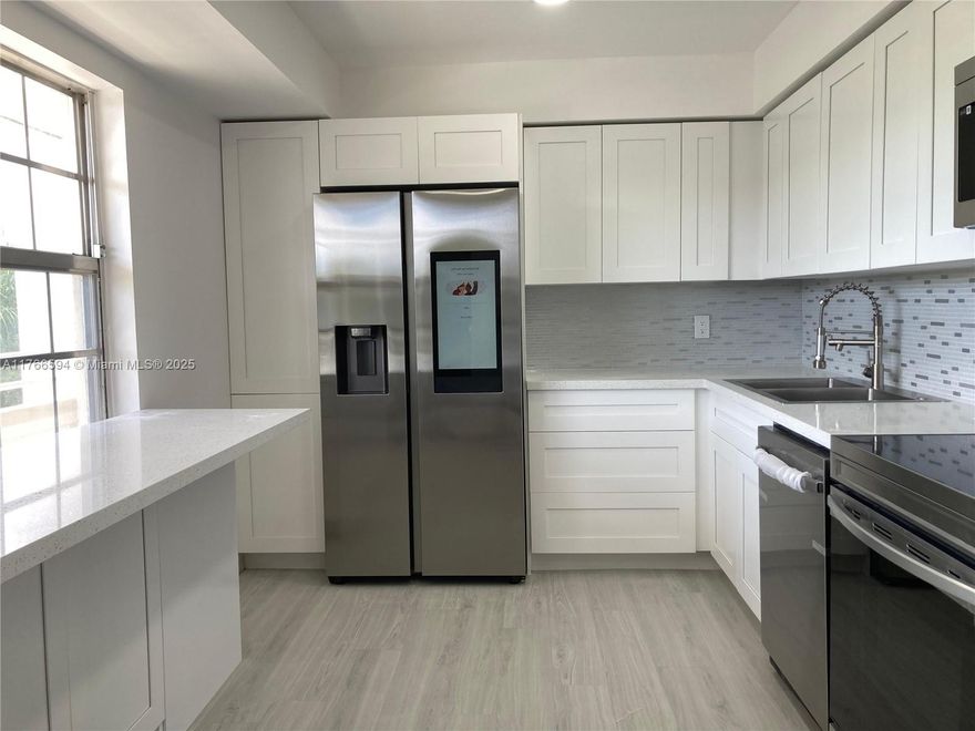 Spacious 3-Bed, 2.5-Bath Condo in Palm Aire Country Club. Move-in-ready condo with stunning water and golf course views from your private screened balcony. Features new AC (2022), luxury vinyl floors, and a modern kitchen with white cabinets, granite countertops, and stainless-steel appliances. Includes in-unit washer & dryer and separate storage unit. The bright living room has large windows showcasing lush surroundings. HOA covers: Cable, internet, water, sewer, trash, landscaping, amenities, exterior insurance, and roof. Building offers an updated elevator, secured lobby, two pools, and BBQ area. No mandatory golf fees! Close to shopping, restaurants, cafés, supermarkets, entertainment, and the new casino. Just 20 minutes from the beach!