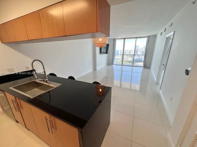 Penthouse level and newly renovated 1/1 condo unit, with unobstructed views of Miami Beach, Brickell, downtown and cruise ships terminal. Unit is equipped with standard appliances such as full size washer/Dryer, Dishwasher, electric range, refrigerator, and Microwave. state-of-the-art fitness center, meeting room and lounge, convenient store, full time security, and 24/7 valet. One assigned parking spaces. NO SUBLEASING ALLOW AT ALL. Close to Margaret Pace Park, supermarkets, banks, restaurants, metro-mover, bus station, Adrian Arsh Center, Miami Heat Arena and entertainment. Near Midtown, Wyndwood and the Design District.All utilities included EXCEPT electric. Please call or text listing agent