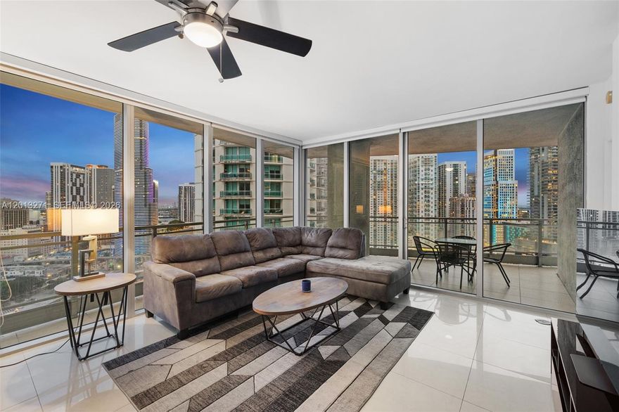 Experience elevated Brickell living in this exceptional 2-bedroom, 2.5-bath corner residence at The Ivy Condominium, the largest 2-bedroom line the building has to offer. A spacious wraparound balcony showcases sweeping views of the Miami skyline, the Miami River, and stunning sunsets. Inside, modern finishes, stainless steel appliances, floor-to-ceiling windows, and an in-unit washer and dryer offer a seamless blend of comfort and sophistication. The unit includes one assigned parking space for added convenience. Residents enjoy newly renovated, resort-style amenities including a state-of-the-art fitness center, full-service spa, pool, business center, game room, BBQ area, outdoor playground, valet, 24-hour security, on-site market, and more. Located within the Miami River Faena District and a private, guard-gated Riverfront community, this home offers both exclusivity and accessibility—just moments from Brickell City Centre, top-tier dining, and entertainment. With easy access to I-95 and the Metromover, this residence delivers the best of vibrant urban living.