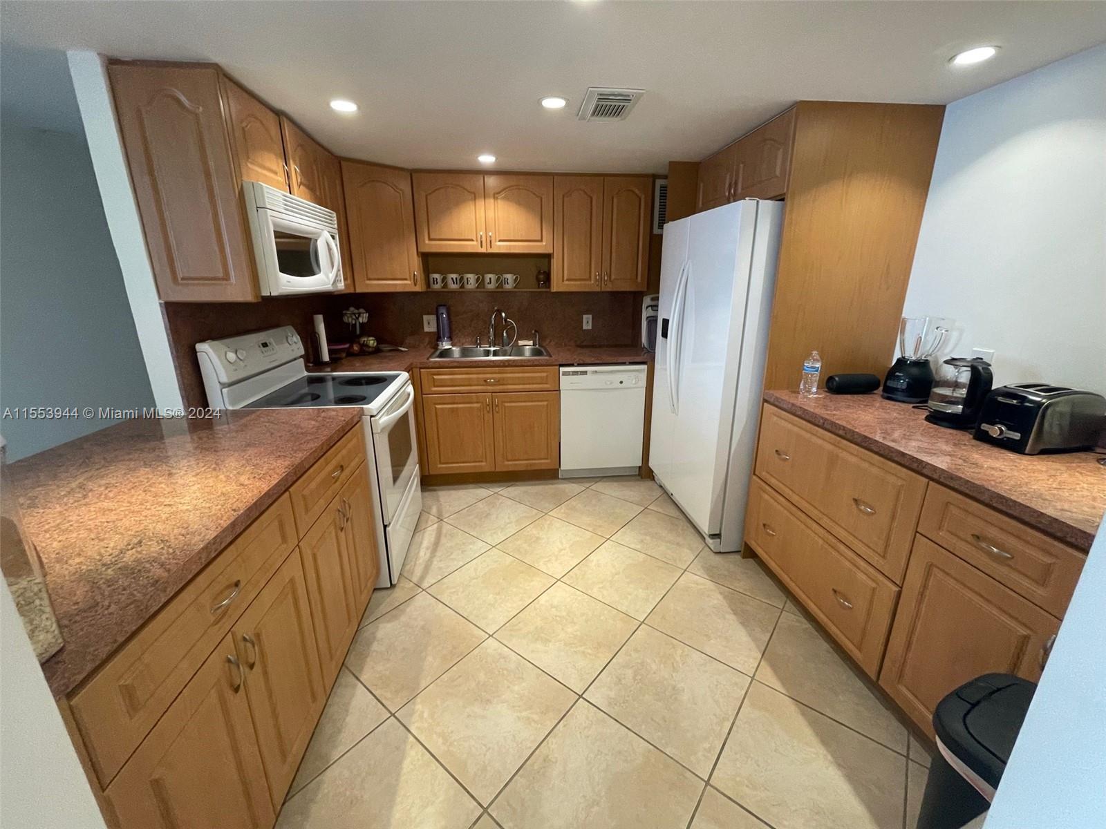 BEAUTIFUL UPDATED 2 BEDS/2 BATHS CONDO AT ADMIRALS PORT! AMAZING WATER VIEWS. TILE FLOORING THROUGHOUT. CUSTOM MADE CLOSET INTERIORS. ENJOY MANY RESORT STYLE AMENITIES SUCH AS POOLS, FITNESS CENTER, TENNIS COURTS, BBQ GRILL AREA, LIBRARY AND MORE. GREAT LOCATION IN AVENTURA! WALK TO SUPERMARKET, RESTAURANTS AND SHOPS!! 2 ASSIGNED PARKING SPACES INCLUDED!!