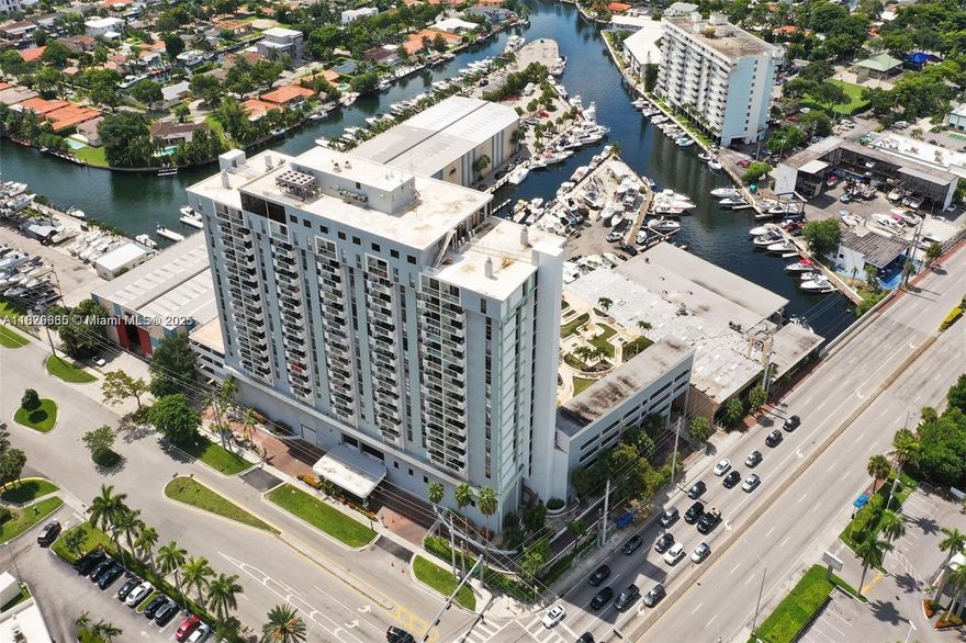 Commercial office for sale, featuring a reception area and three separate small rooms. The unit offers 670 sq ft and is located on the second floor. There is plenty of free parking available for the commercial units on the ground level. The first and second floors of the building consist of commercial offices/units, while the remaining floors are residential. Conveniently situated across the street from several restaurants, including Starbucks. Most uses are allowed: office, medical or small retail warehouse. Eligible for E2 visa investment. AC in great condition, ample ground floor parking, bathrooms, swimming pool.