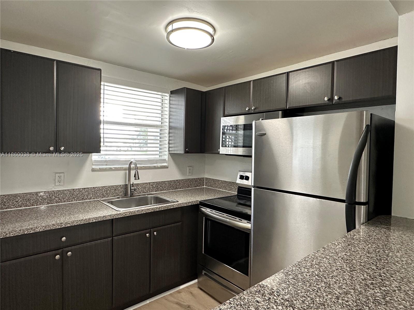 SPACIOUS, newly updated 1 bedroom/1bath apartment in Davie!!! Charming 1st floor unit with beautiful wood flooring, new lighting and central AC. Very large living and dining room area with full kitchen and brand new appliances. Plenty of closets for ample storage space. Located in a quiet community, with a full laundry room on-site. Waste, maintenance, pest control + 1 assigned parking space included in rent. Guest parking on property. Pets welcome with 1x pet fee. Property is in a great area - centrally located yet tucked away on a quiet street, close to all of the major highways (A1A, US1, I-95, turnpike etc). Down the street from Nova! Everything nearby such as shops, restaurants, schools, and parks...Only 10 min from Hard Rock, Seminole Classic Casino, Dania Point, Broward Mall & more!