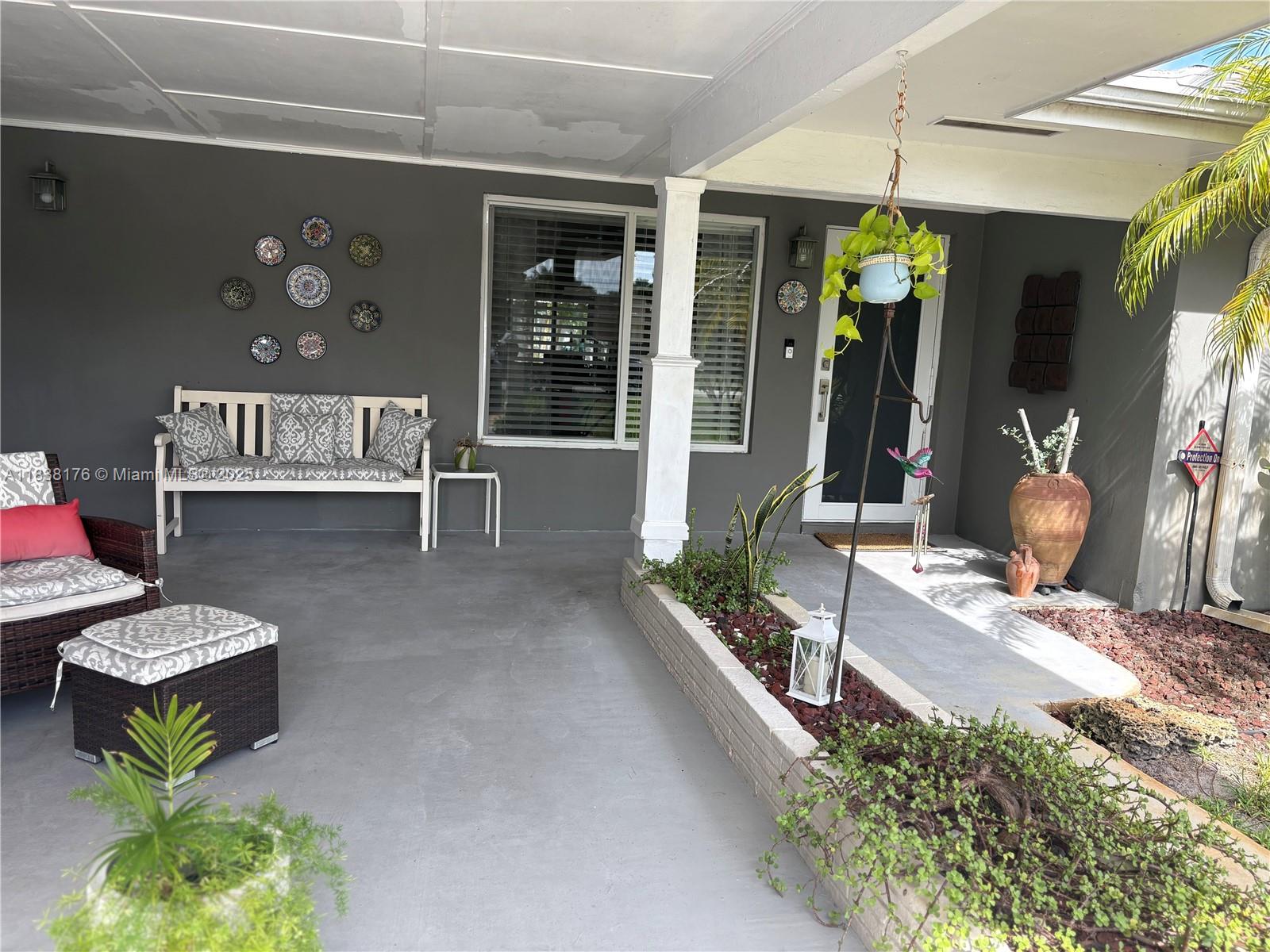 Charming, totally renovated home with a coastal living atmosphere. Large back porch with beautiful tropical landscaped backyard, perfect for easy entertaining. Enter this "Home Sweet Home" and be captivated by its warm atmosphere. Close to Ft. Lauderdale Beach and business district. Impact windows, tile floors.