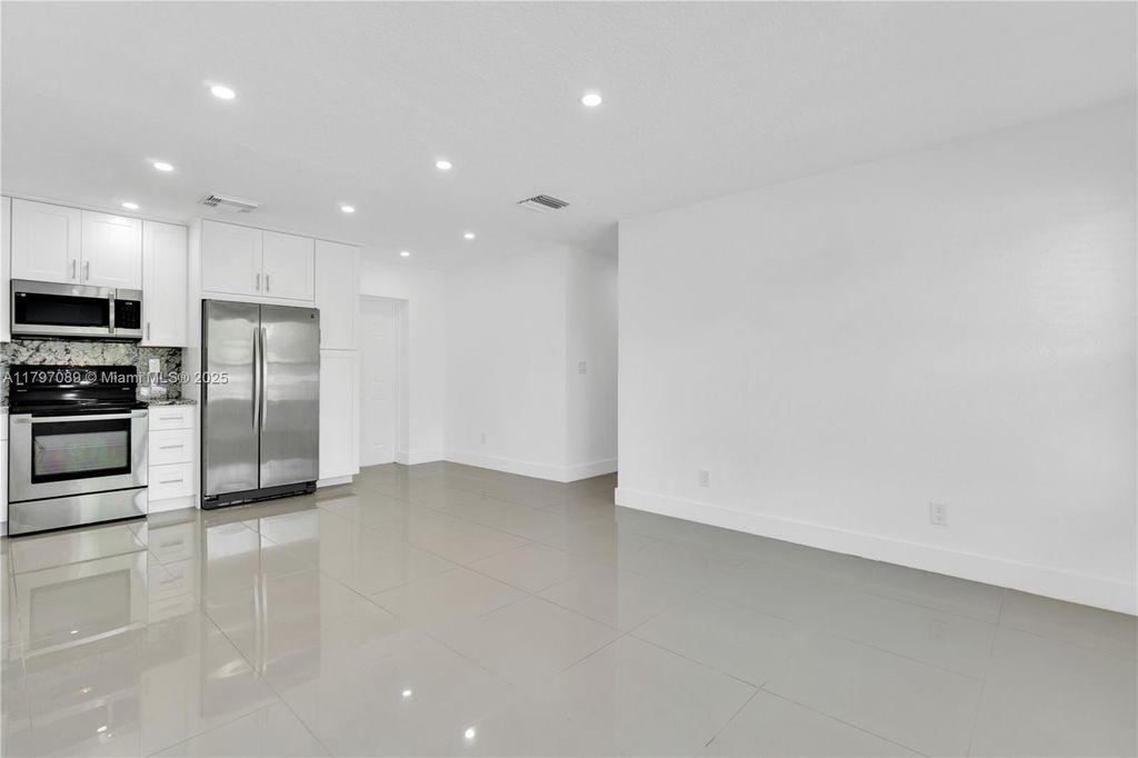 Photo of 4740 NE 2nd Ter, Deerfield Beach, FL 33064 (MLS # A11797089)