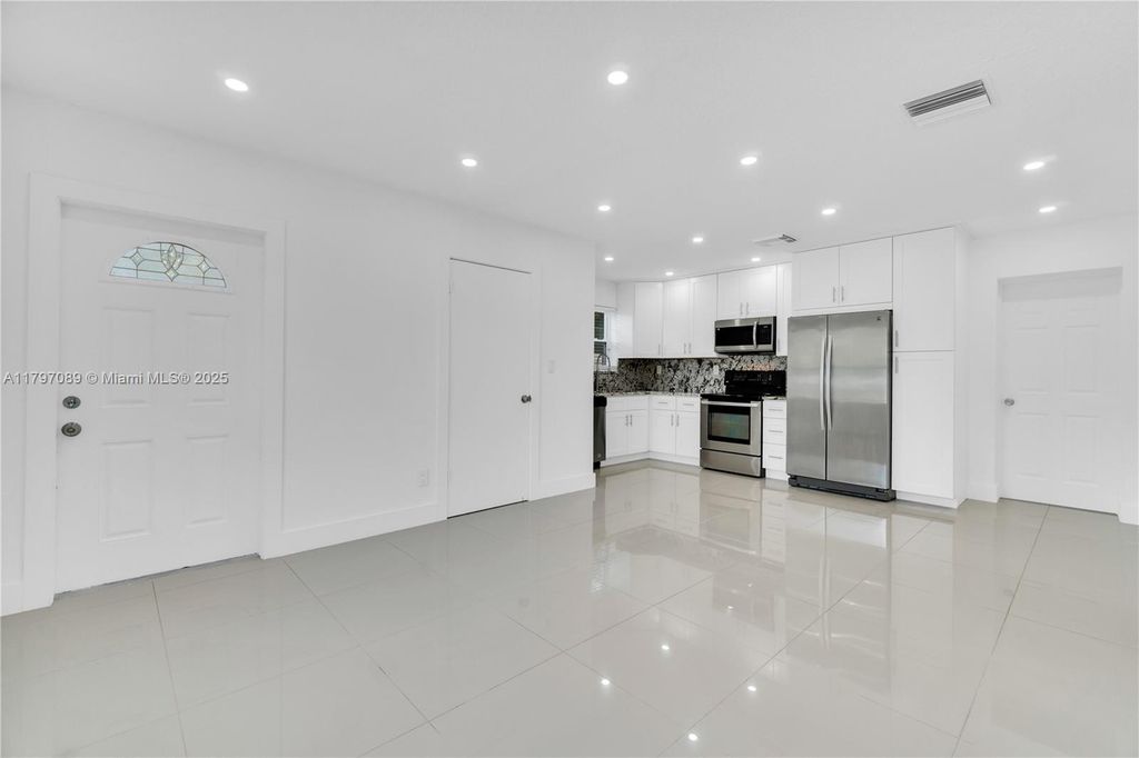 Photo of 4740 NE 2nd Ter, Deerfield Beach, FL 33064 (MLS # A11797089)