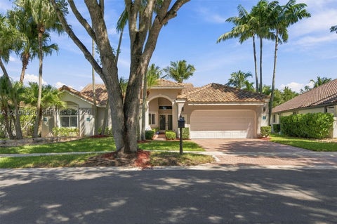 Photo of 809 Heron Rd, Weston, FL 33326 (MLS # A12106936)