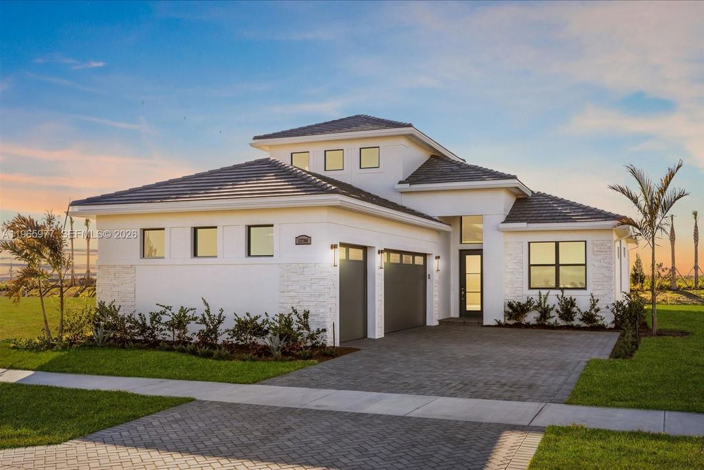 Photo of 13704 SW Shinnecock Dr, Port St Lucie, FL 34987 (MLS # A11965977)