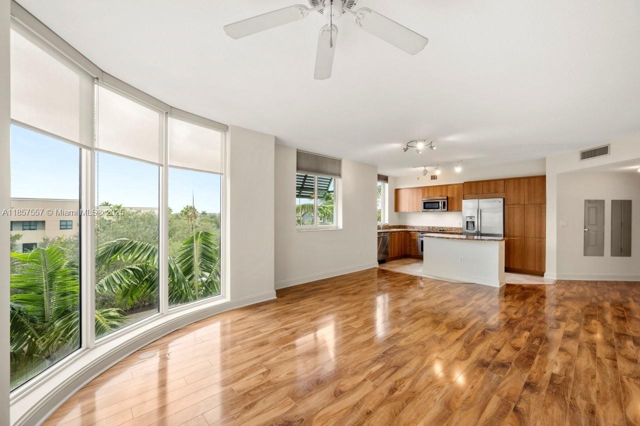 Stunning 2BR/2BA condo in pristine, move-in condition! Bright open layout with wood floors, granite counters, S/S appliances, and impact glass. Luxury touches include European cabinetry, marble shower, soaking tub, and smart key FOB entry. Enjoy resort-style living with elegant lobby, tropical pool & Jacuzzi, fitness center, dry sauna, 24-hr manned front desk, and advanced security systems. Internet, cable TV, and water included—your perfect home awaits!